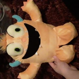 Yellow monster plushie